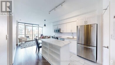 Building Photo - 126-2126 Simcoe St