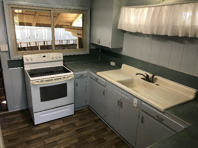 Building Photo - PAHOA AVE 3/1.5/2 ceiling fans, W/D, yd w/svc