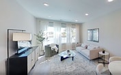Step into a world of modern elegance at The Lofts At Gloucester. This meticulously crafted 980 sq ft apartment is your gateway to an aspirational lifestyle. The heart of the home is a breathtaking open-concept kitchen and living area, where sleek design meets functionality. The kitchen boasts premium stainless steel appliances, rich dark cabinetry, and a stylish breakfast bar, perfect for casual dining or entertaining.

The living room is a haven of tranquility, bathed in natural light from large windows that frame picturesque views. A plush area rug and contemporary furnishings create an inviting atmosphere for relaxation or socializing. The primary bedroom is a generous 150 sq ft retreat, featuring a private balcony that beckons you to enjoy your morning coffee amidst fresh air and scenic vistas.

Three luxurious bathrooms offer spa-like experiences with modern fixtures and elegant finishes. The attention to detail is evident throughout, from the carefully curated decor to the thoughtful layout that maximizes space and flow. Energy-efficient recessed lighting and ample storage solutions, including two closets, add both style and practicality to this urban oasis.

This is more than just a home; it's an opportunity to elevate your daily life. Whether you're a young professional, a small family, or anyone seeking a blend of comfort and sophistication, this apartment offers the canvas for you to paint your dreams. Welcome to a life of inspired living at The Lofts At Gloucester.