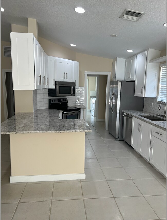 Building Photo - ***ANNUAL RENTAL***POOL HOME***LOCATED IN ...