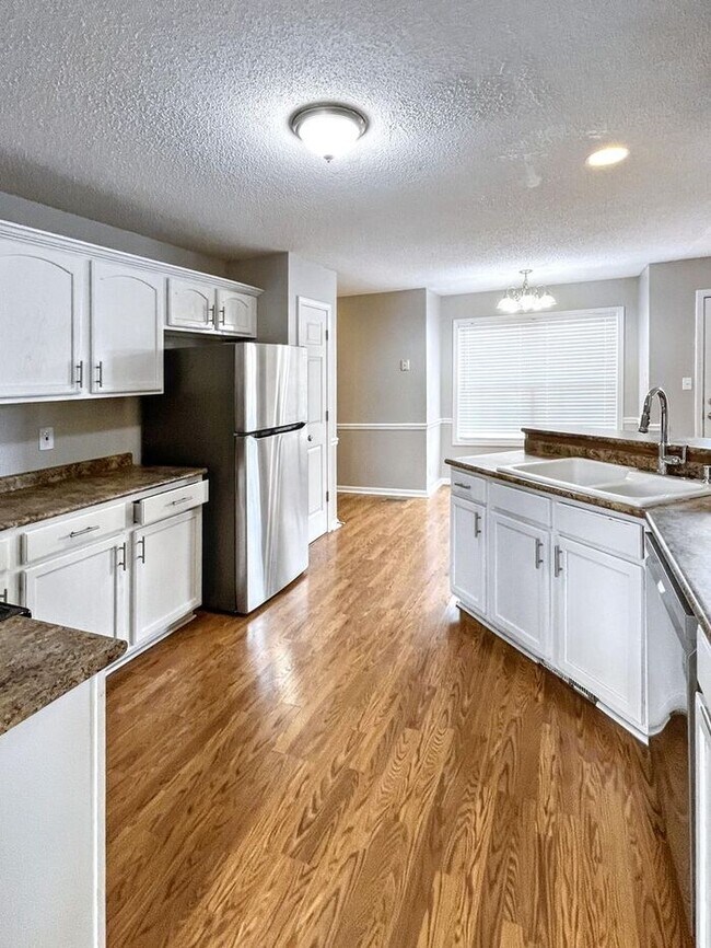 Building Photo - Spacious 3-Bedroom Home with Deck, Firepla...