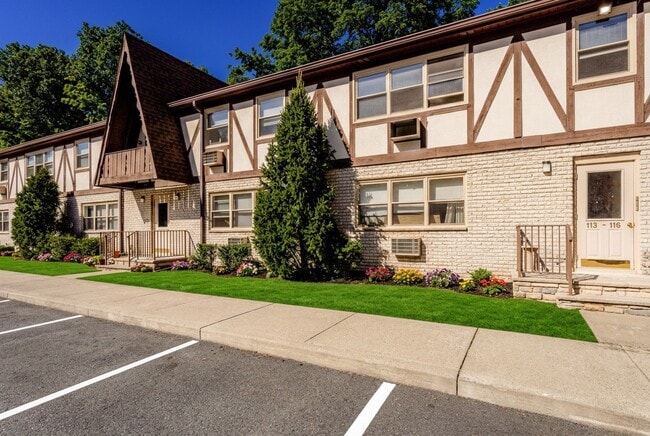 Treetop Apartments offers charming architecture and well-kept landscaping that enhance your living experience. Enjoy convenient parking and a serene environment. Explore your new home in a vibrant community that complements your lifestyle. Schedule a tour today! - Treetop Apartments