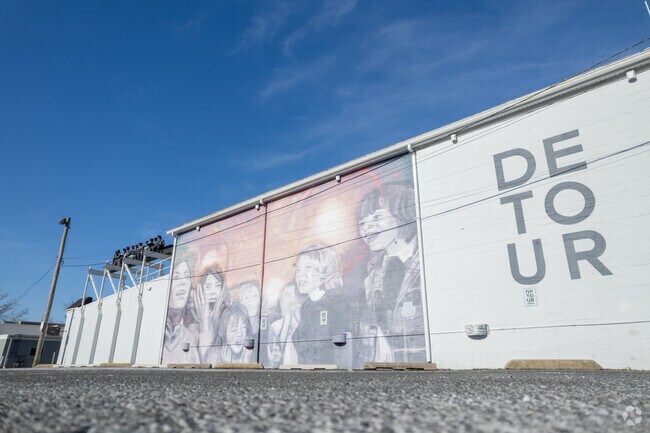 Red Bank is home to a vibrant arts community, showcased in exhibits like the Detour Art Gallery.