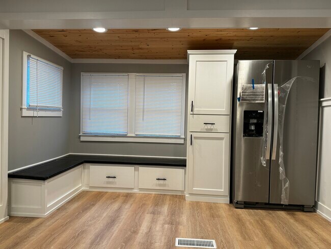 Customer built in pantry w/pullout garbage, silverware drawer and storage above - 24130 W Commercial St