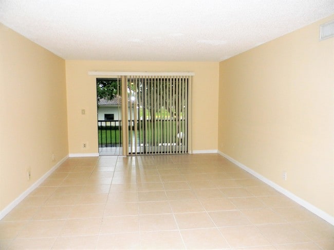 Building Photo - 9960  Pineapple Tree Drive 209