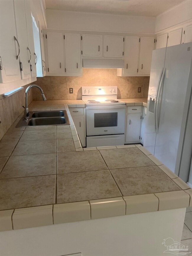 Building Photo - 7150 Dogwood Terrace Dr