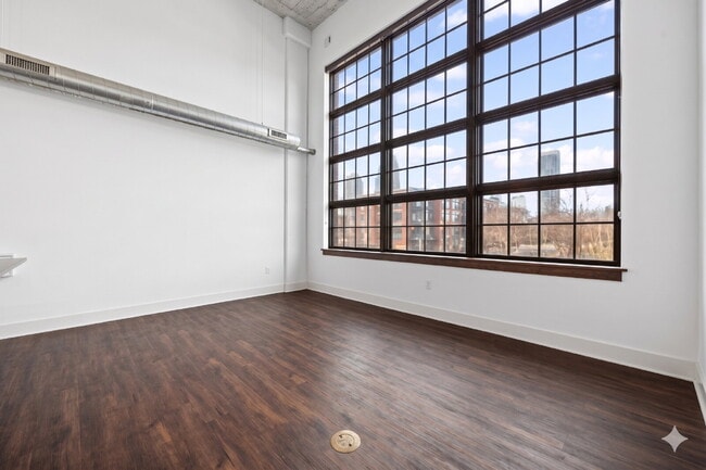 Building Photo - Urban Loft Condo Featuring Stunning Views & Rooftop Entertaining