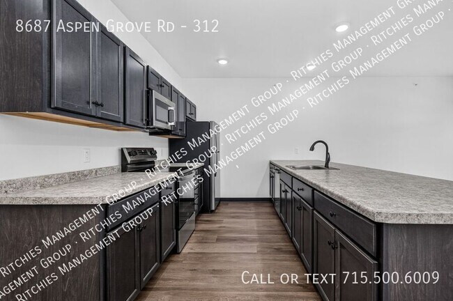 Building Photo - 8687 Aspen Ln
