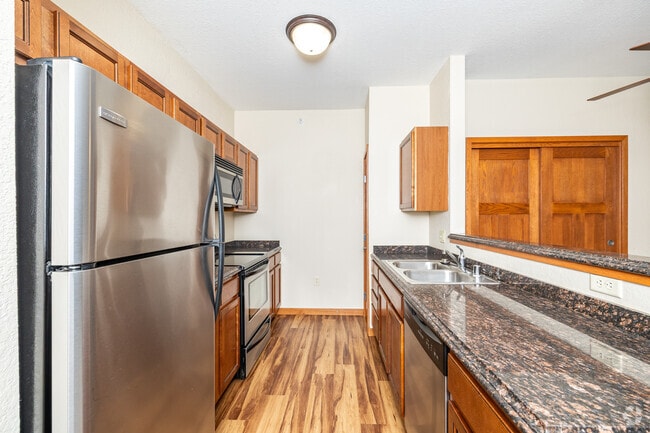 2BR, 1BA - 1076SF - Kitchen - Heritage West Allis Senior Apts