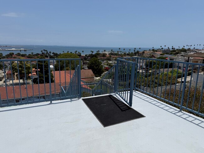 Private gated entrance to deck and unit - 3325 S Carolina St