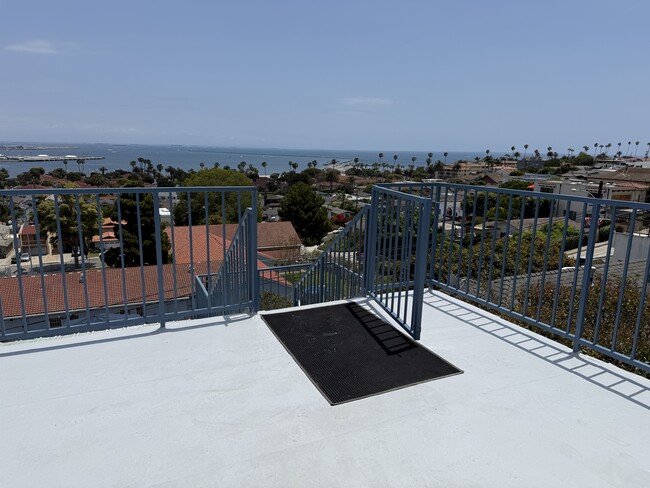 Private gated entrance to deck and unit - 3325 S Carolina St