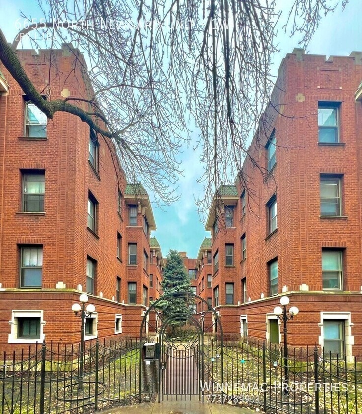 Building Photo - 6655 N Newgard Ave
