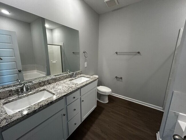 Building Photo - Beautiful 4-Bedroom Home with Serene Outdo...