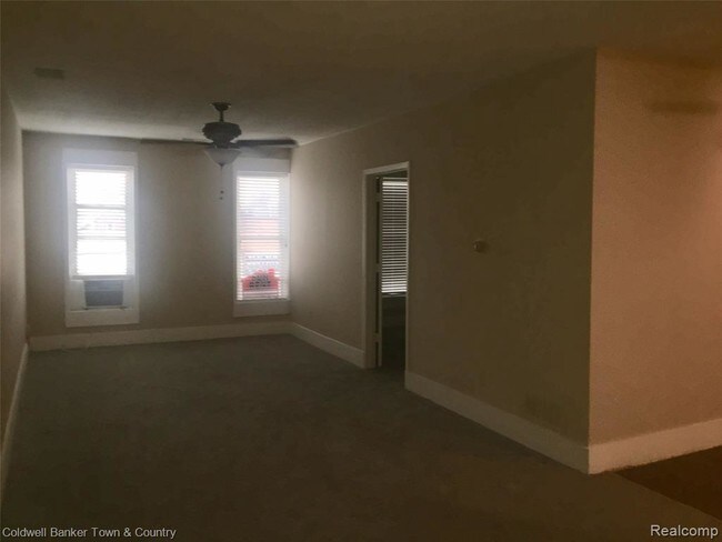 Building Photo - 145 E Grand River Ave