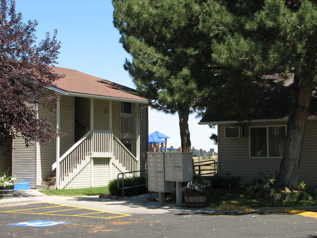 Building Photo - Evergreen Village Apartments