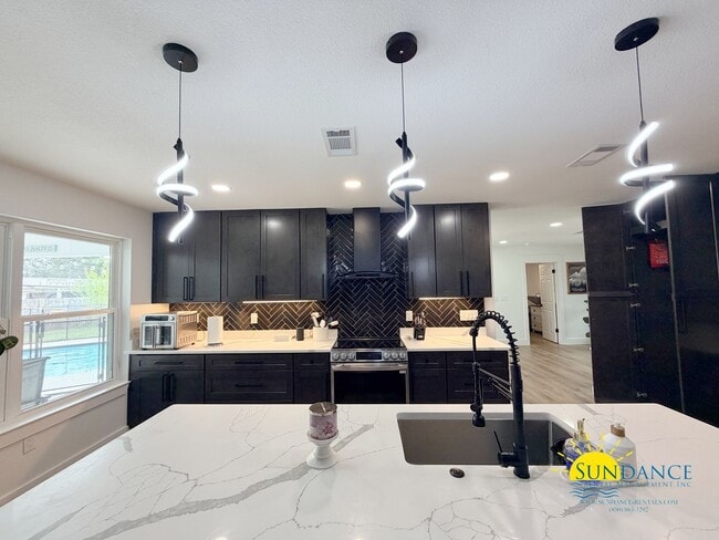 Building Photo - Custom 4BR Pool Home in Kenwood with Bonus Room & Private Backyard!