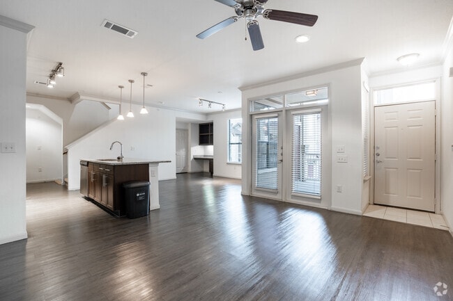 3BR, 2.5BA - 1,563SF - Living Room - The Crossing at Katy Ranch