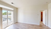 Located at 1024 Prospect Ave in Santa Rosa, CA, this one-bedroom, one-bathroom unit offers a well-organized, efficient layout across a single floor. The living room is bright and open, featuring light wood-style flooring, neutral walls, and a sliding glass door that leads to a private balcony, flooding the space with natural light and providing pleasant outdoor views. Adjacent to the living area, the dining space connects seamlessly to a functional kitchen outfitted with warm honey-oak cabinetry, white appliances including a refrigerator, electric range, microwave, and dishwasher, along with a double-basin sink beneath a natural light-filled window. The bedroom is a comfortable, carpet-floored retreat with a large window framing greenery views, a closet for storage, and direct access to the bathroom. The bathroom features a full tub-shower combination with chrome fixtures and a clean, white surround. Throughout the unit, a consistent neutral color palette and wood-style flooring in the main living areas create a cohesive, move-in-ready feel. The unit also benefits from multiple windows ensuring consistent natural light throughout.