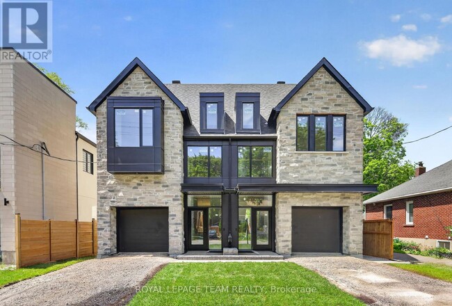 Building Photo - 608 Tweedsmuir Ave