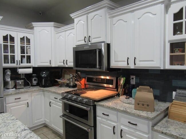 Building Photo - 4 br, 3 bath House - 10402 N 114th E Ave