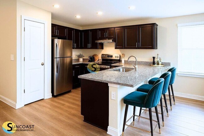 Foto del edificio - 6450 Sweetbay Ln