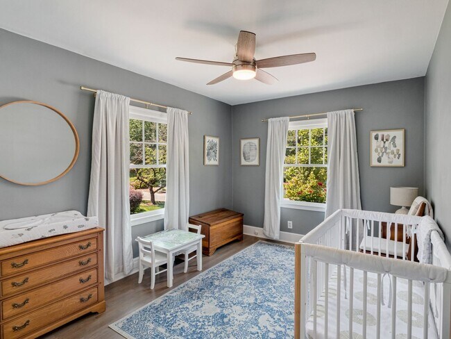Building Photo - Spacious, updated family home in friendly,...