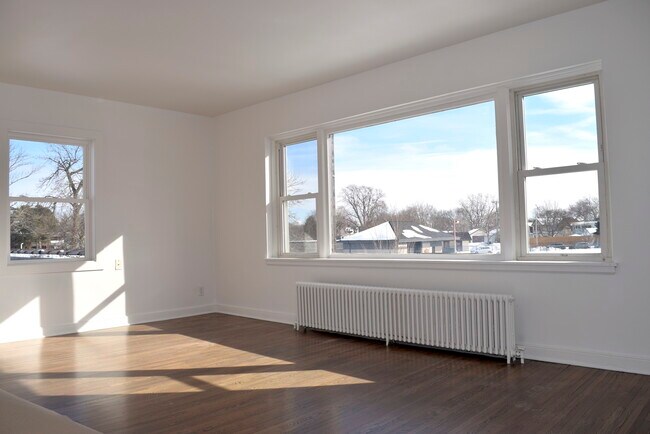 Sunlit large living room - 6534 W Lake St