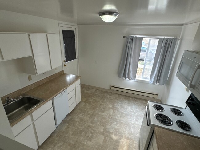Foto del edificio - 218 E 3rd St