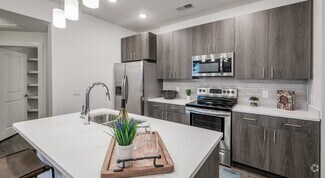 Building Photo - 9090 Creekside Forest Dr