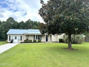 Building Photo - 304 Woody Way