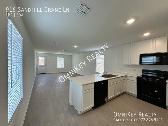 Foto del edificio - 916 Sandhill Crane Ln