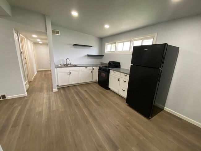 Building Photo - Open Concept 4 Bedroom Gem