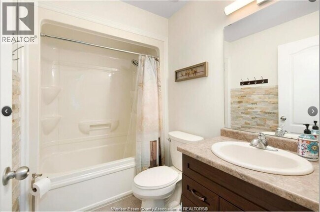 Photo du bâtiment - 1019 Aspen Ridge Cres