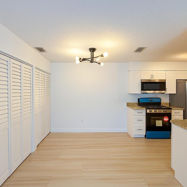 Foto del edificio - 4055 NW Cinnamon Tree Cir