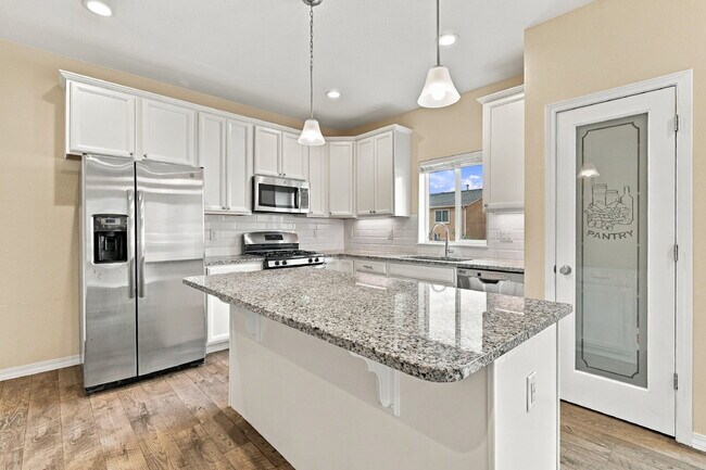 Building Photo - $2,445.95 - 4 Bed, 2.5 Bath Townhome with Attached Garage and Central AC!