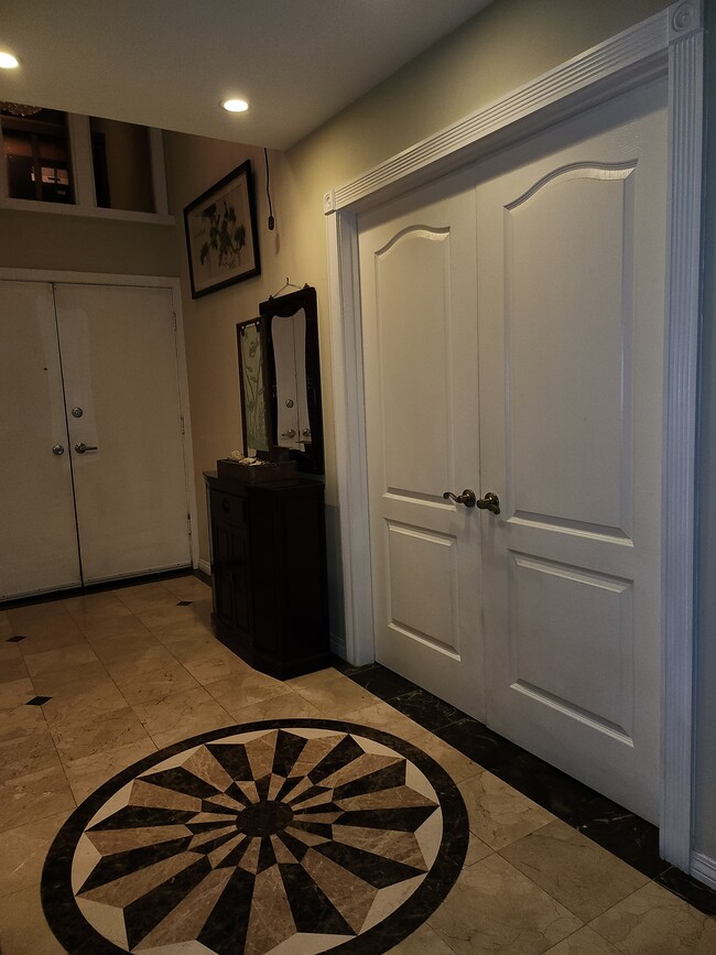Foyer with Double Doors Leading to Master Suite - 17631 Mapes Ave