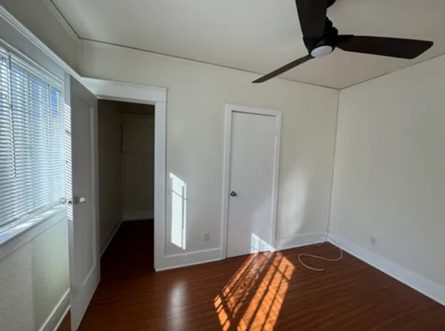 Bedroom off of living room features large closet (left) and bathroom access (right) - 2235 S Redondo Blvd