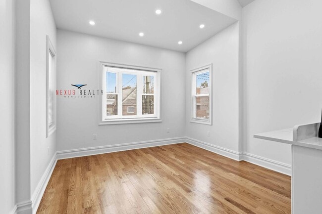 Building Photo - 21-28-28 48th St