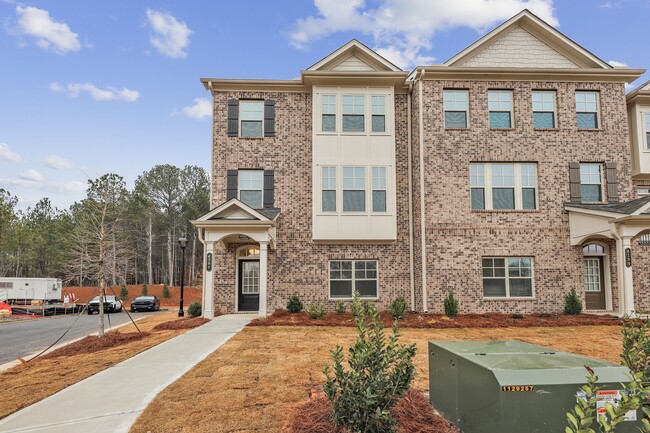 Fachada de las homes adosadas - Greystone Suwanee