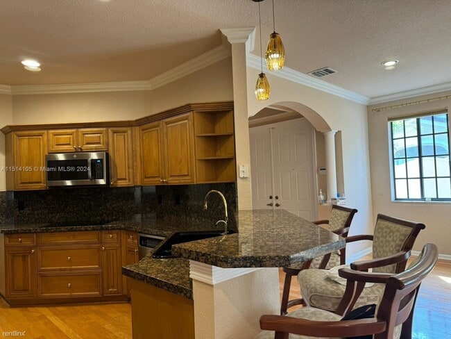 Building Photo - 3 br, 2 bath House - 1620 Passion Vine Cir...
