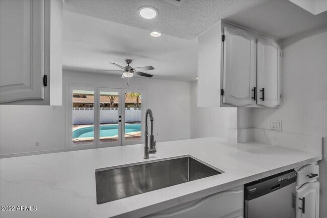Building Photo - 8207 E Montebello Ave