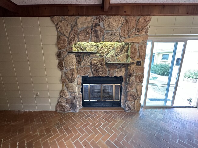 Woking fireplace with fan for heat - 353 E Airport Ave