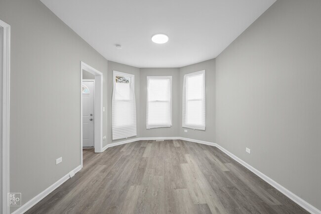 Building Photo - 7218 S Peoria St