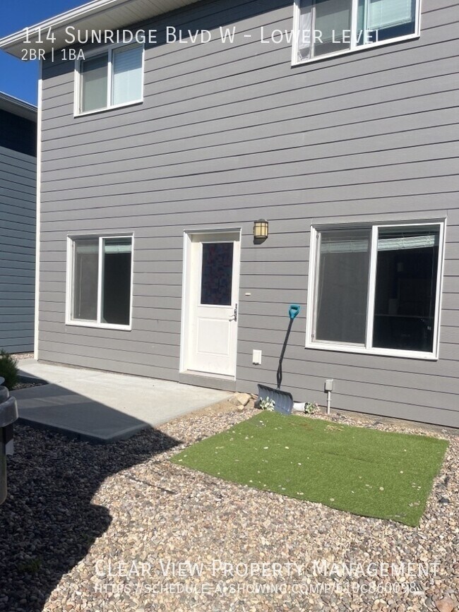 Building Photo - Amazing 2-bedroom, 1-bathroom suite with zero scaped yard!