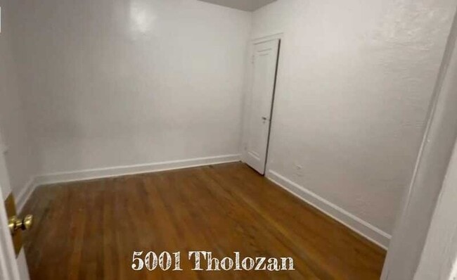 Building Photo - 5001 Tholozan Ave