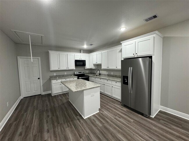 Foto del edificio - 6163 Ridgeway Dr