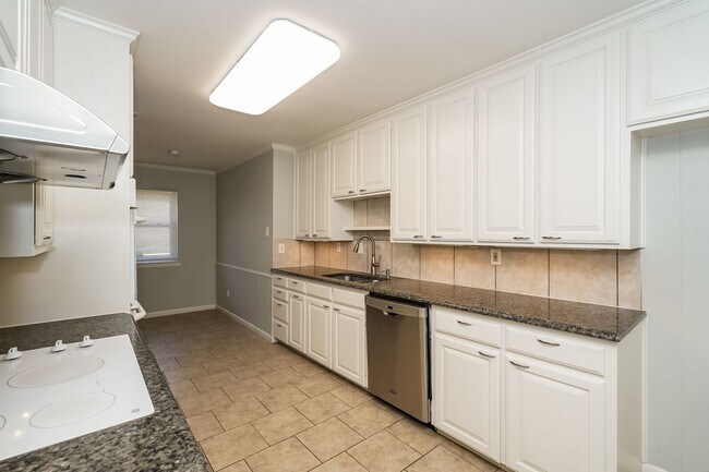 Building Photo - 4 BR/3BA | Updated Single Family Home | 2-Car Garage Parking | In Bedford!