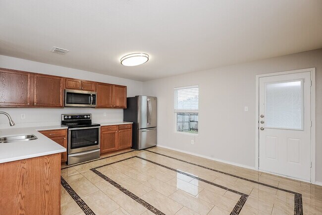 Foto del edificio - 8123 Stowe Springs Ln