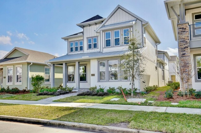 Photo - Gorgeous 4/3 Residence with a Private Back Lanai and a 2 Car Garage in the Delightful Laureate Pa... House