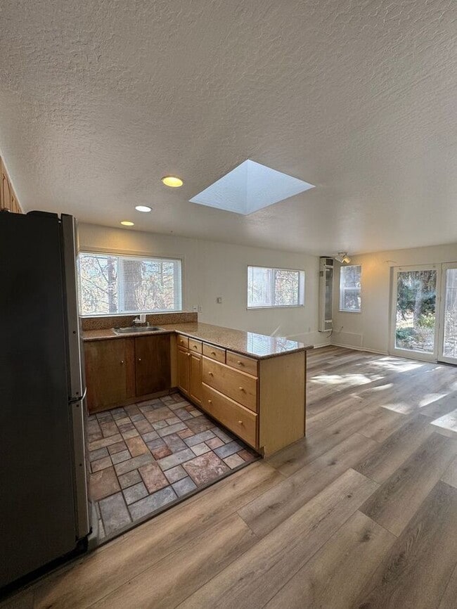 Building Photo - Charming Riverfront Cottage in Verdi – One...